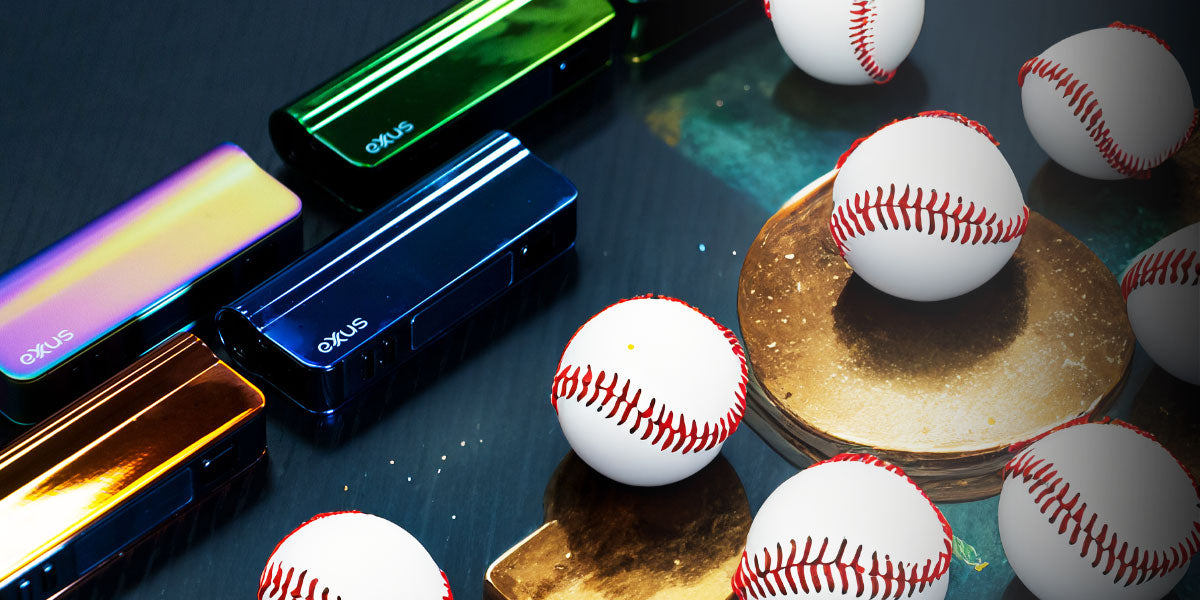 Exxus Snap VV Pro on desk with baseballs on golden platforms nearby