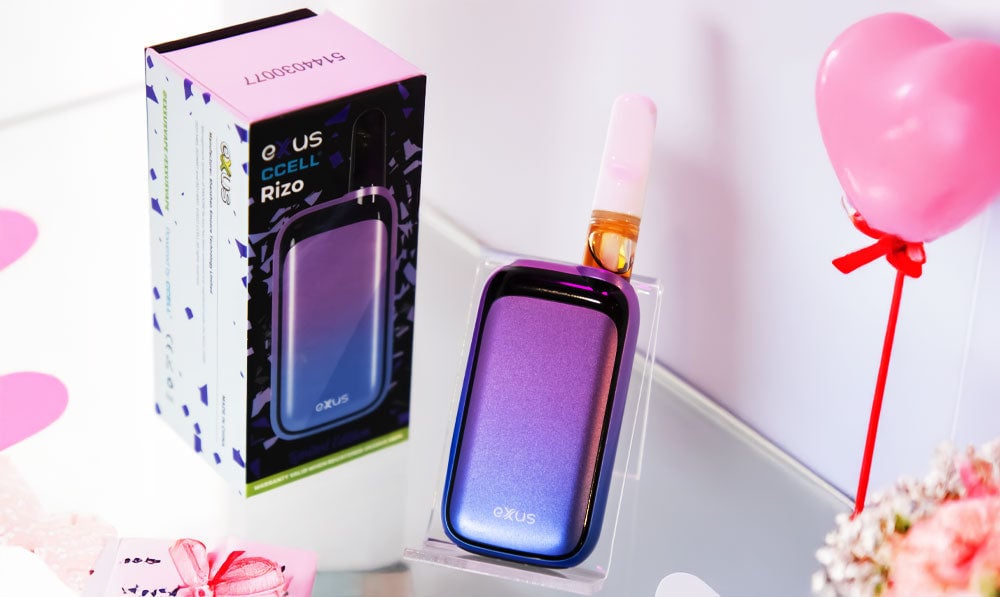 Nebula Rizo 510 thread battery beside its box with a Valentine's balloon