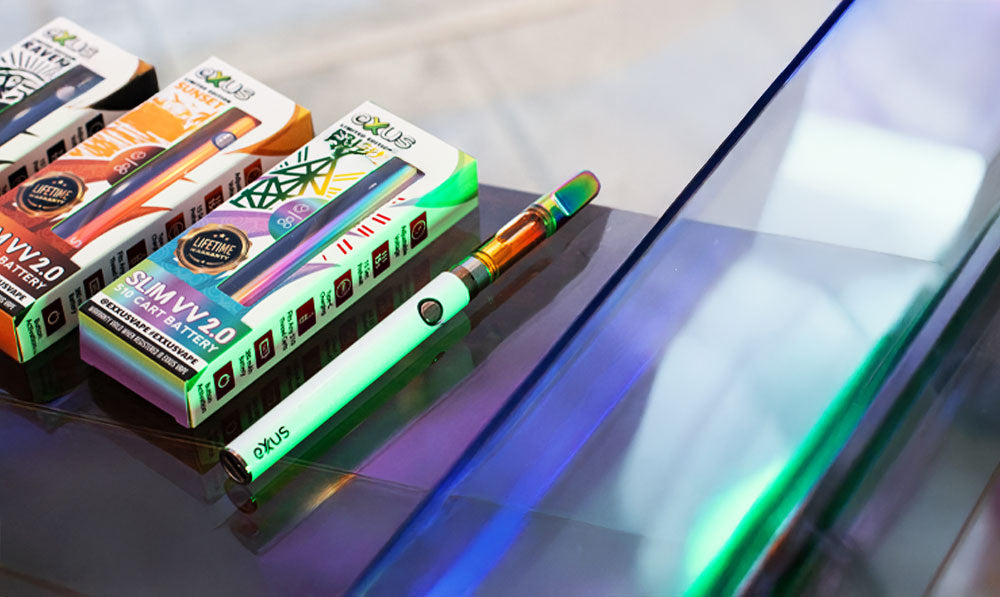 Slim VV 2 resting on colorful glass surface