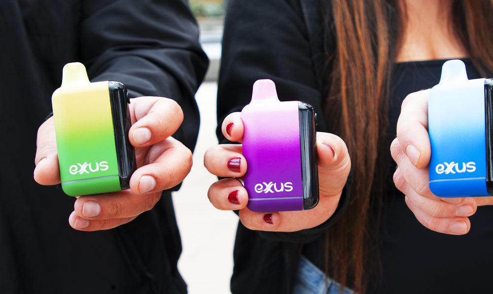 Group of people holding Exxus Snap DLX outside