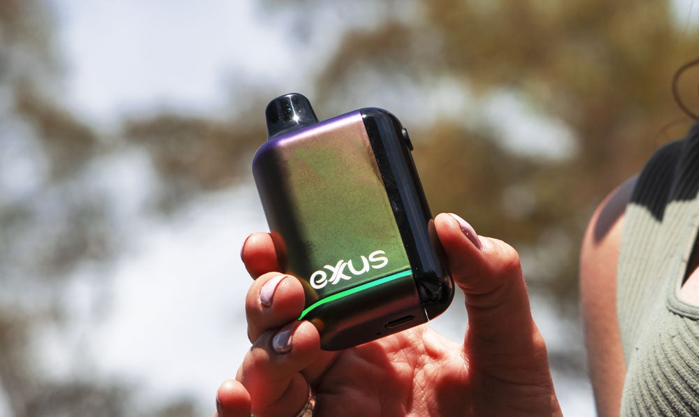 Woman holding Exxus Snap DLX at park