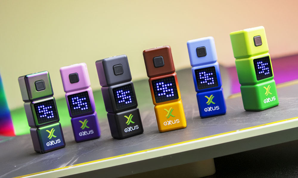 Exxus Stax units lined up in front of colorful background