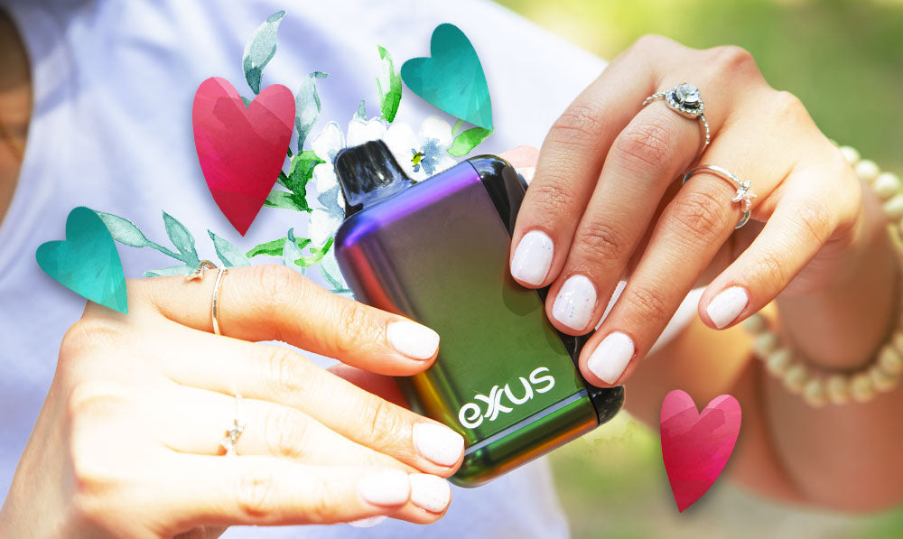 Person holding an Exxus Snap DLX with heart decorations