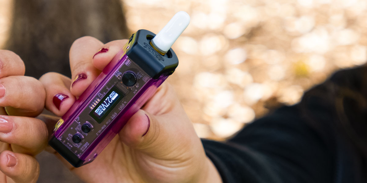 woman holding the Exxus Adapt at park