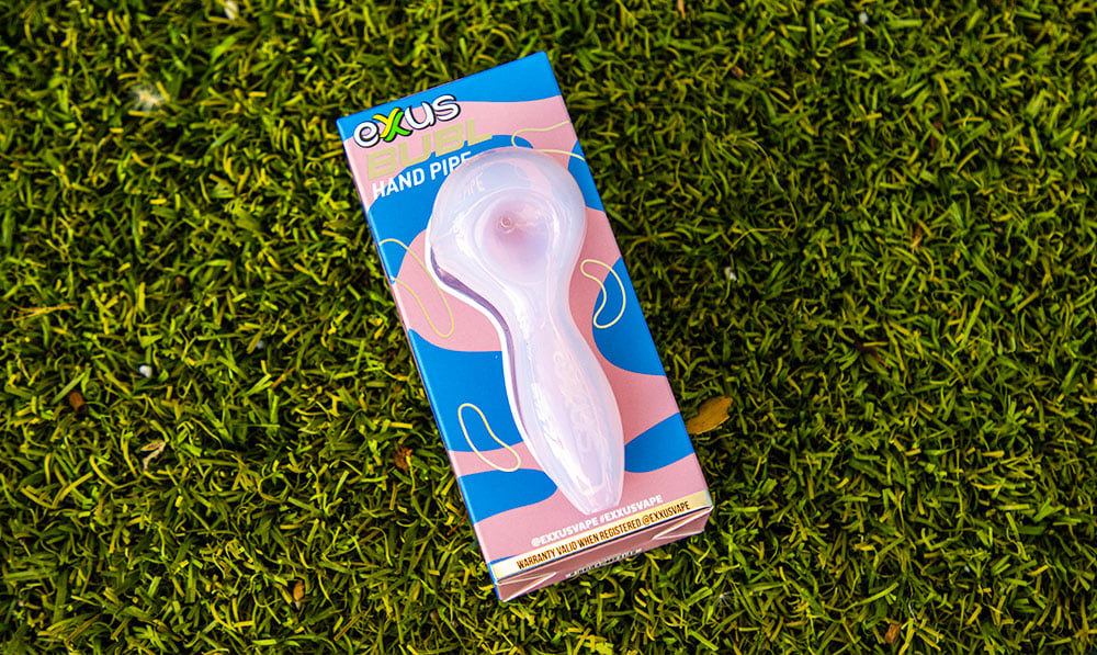 Exxus Bubl Hand Pipe sitting on grass